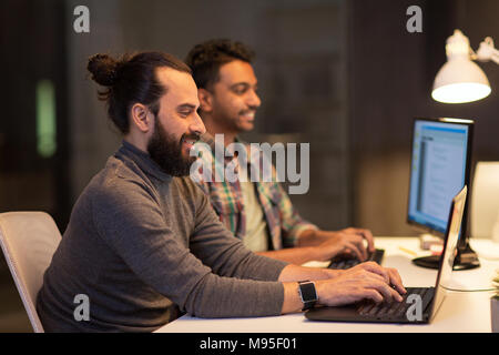creative team with computers working at office Stock Photo