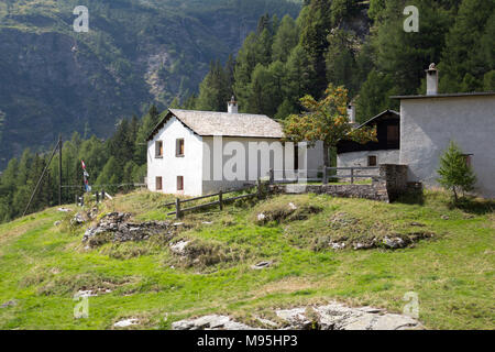 Bernina Railway links St. Moritz, Switzerland, with the town of Tirano, Italy, via the Bernina Pass Stock Photo