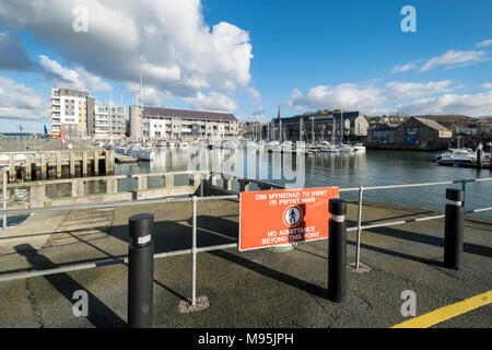 Caernarfon docks or yacht marina on the Menai strait in North Wales UK Stock Photo