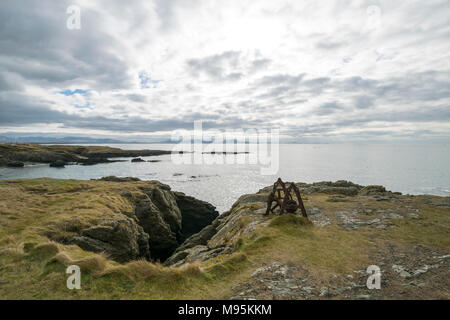 Anglesey coast facing South towards the Lleyn Peninsula in the Distance Stock Photo