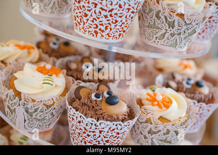 Cupcakes on cake stand at wedding breakfast Stock Photo