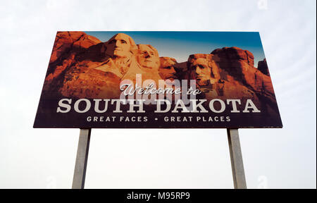 Colorful highway sign letting drivers know the South Dakota boundary Stock Photo