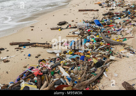 polluted beach  - plastic waste, trash  and garbage closeup - Stock Photo