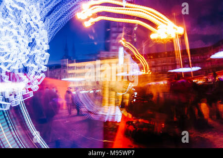 Madrid, Spain :  Abstract composition of the Christmas market in Plaza Mayor square illuminated at dusk. Stock Photo