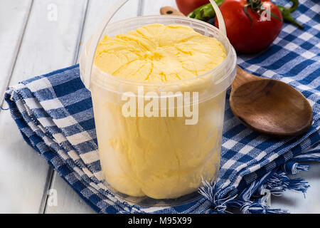 two fresh butter curls on white background Stock Photo