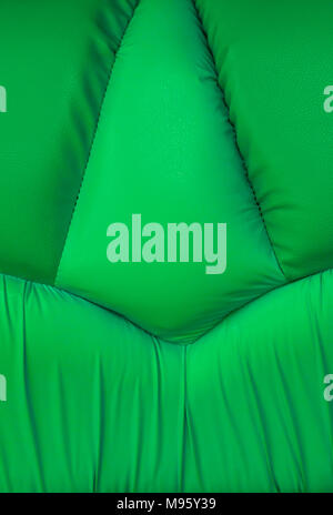 Backgrounds of green leather sofa with stitch texture Stock Photo