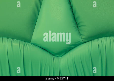 Backgrounds of green leather sofa with stitch texture Stock Photo