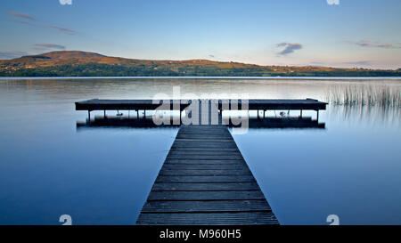 Wooden jetty on the shore of Lough Derg, County Clare, Ireland Stock Photo
