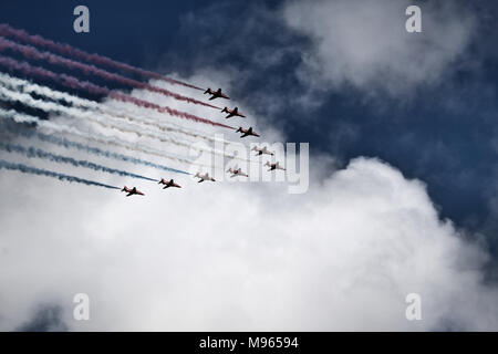 The Red Arrows flying over Liverpool Stock Photo