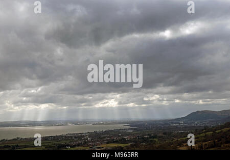 Sunbeams over Belfast, from the Knockagh, County Antrim. Stock Photo