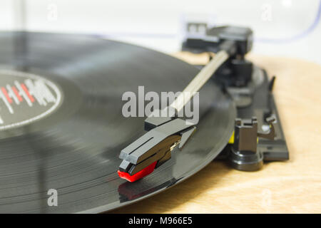 A record playing on a record player Stock Photo