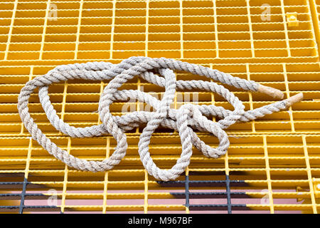 White wavy rope isolated on white. Seamless pattern. Stock Photo