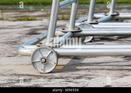 Rusty iron wheel base of iron structure Stock Photo