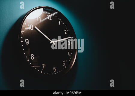 dark wall clock Stock Photo