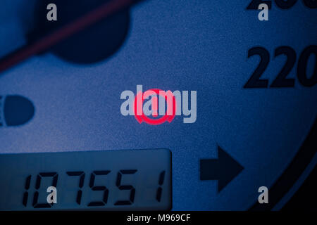 Handbrake warning light sign illuminated close up Stock Photo