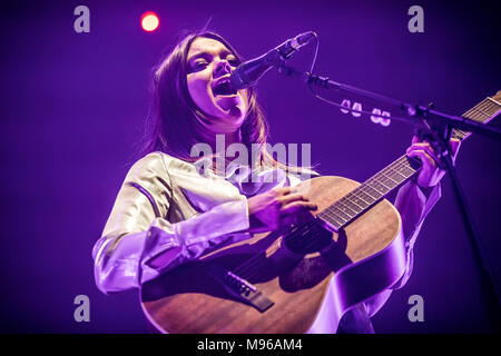 Norway, Oslo - March 13, 2018. The Swedish indie folk duo First Aid Kit performs a live concert at Oslo Spektrum in Oslo. The here singer and guitarist Klara Söderberg is seen live on stage. (Photo credit: Gonzales Photo - Terje Dokken). Stock Photo