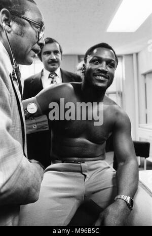 Super Fight II was a non-title boxing match between Muhammad Ali and Joe Frazier. The second of the three Ali vs Frazier bouts, it took place at Madison Square Garden in New York City on January 28, 1974. Ali was a slight favourite to win, and did by a unanimous decision. (Picture) Joe Frazier having a pre-fight medical for 'Super Fight II.' Stock Photo