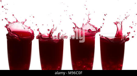 Sequence of splashes on raspberry juice against a white background Stock Photo