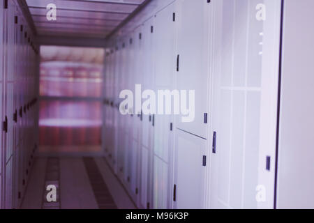 modern server room with white servers and hardwares in a internet data center Stock Photo