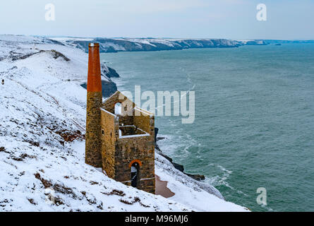 an old tin mine in winter on the coast of cornwall, england, uk. Stock Photo