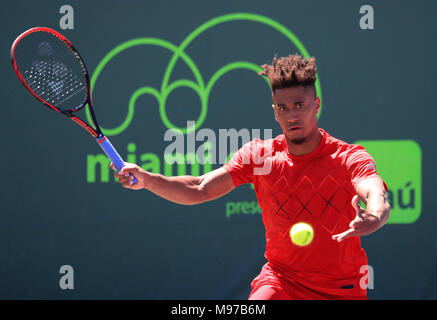 Key Biscayne, Florida, USA. 23rd Mar, 2018. Michael Mmoh from the United States of America plays against Roberto Bautista Agut from Spain during an early round of the 2018 Miami Open presented by Itau professional tennis tournament, played at the Crandon Park Tennis Center in Key Biscayne, Florida, USA. Mmoh won 7-6(4), 2-6, 6-4. Mario Houben/CSM/Alamy Live News Stock Photo