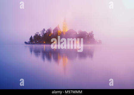 Beautiful foggy sunrise the Bled lake on autumn in Slovenia,Europe Stock Photo