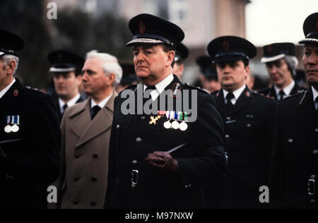 Newry RUC Corry Square police Station in Catherine Street  attacked by the Provisional IRA using homemade Mortar Bomb. Nine RUC officers, seven men and two women. 28 Feb 1985 Sir John Hermon head of the RUC at the funeral of one of his dead officers. These photographs were taken the day after the attack and at the funerals some days later. Wikipedia below: On 28 February 1985, the Provisional Irish Republican Army (IRA) launched a heavy mortar attack on the Royal Ulster Constabulary (RUC) base at Corry Square in Newry, Northern Ireland. The attack killed nine RUC officers and injured almost 40 Stock Photo