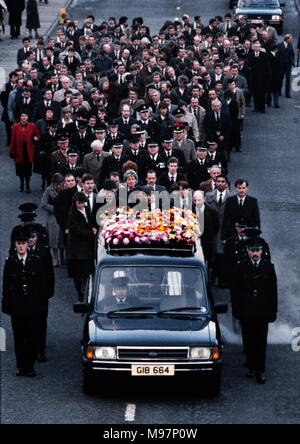 Newry RUC Corry Square police Station in Catherine Street  attacked by the Provisional IRA using homemade Mortar Bomb. Nine RUC officers, seven men and two women. 28 Feb 1985 These photographs were taken the day after the attack and at the funerals some days later. Wikipedia below: On 28 February 1985, the Provisional Irish Republican Army (IRA) launched a heavy mortar attack on the Royal Ulster Constabulary (RUC) base at Corry Square in Newry, Northern Ireland. The attack killed nine RUC officers and injured almost 40 others; the highest death toll ever suffered by the RUC.The attack was join Stock Photo