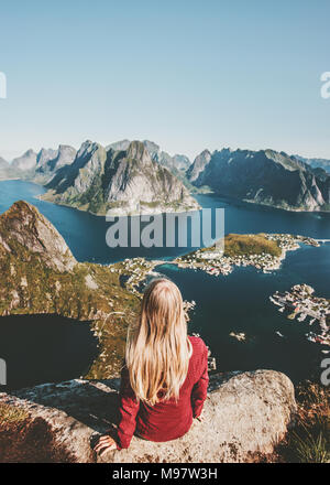 Woman enjoying aerial mountains view  travel in Norway healthy lifestyle concept adventure outdoor summer vacations Lofoten islands Stock Photo
