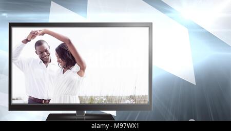 ROmantic couple on televisoin dancing Stock Photo