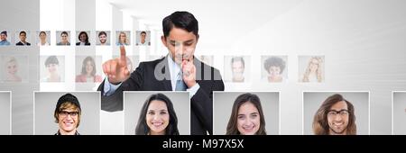 Man touching portrait profiles of different people Stock Photo