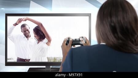 Woman playing ideal romance computer game with controller in hands Stock Photo