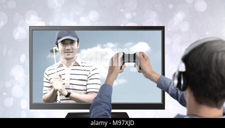 Hands holding gaming controller  with golf player on television Stock Photo