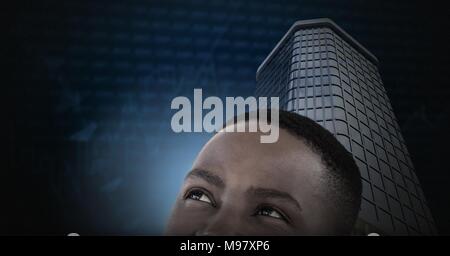 Man looking upwards and Tall buildings with economic finance background Stock Photo