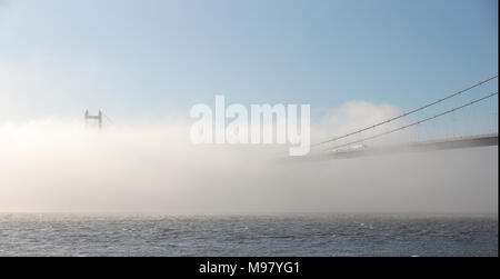 Humber bridge in a fog bank,  Hessle, East Yorkshire Stock Photo