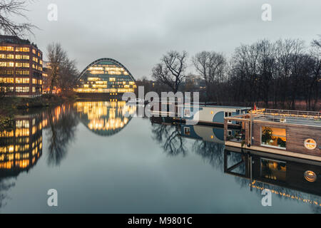 Germany, Hamburg, Hochwasserbassin with house boats, Berliner Bogen in the background Stock Photo