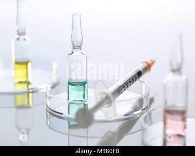 Ampullae in petri dish, syringe Stock Photo