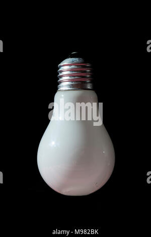 white lamp isolated varticaly on black background Stock Photo
