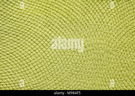 Light lime-green textile background. Stock Photo