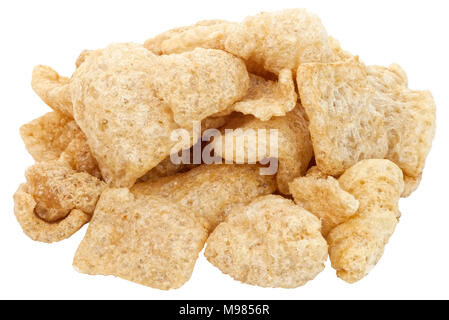 Isolated pile of pork rinds, cracklings or chicharones. Stock Photo