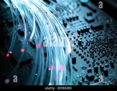 Fibre optics, hardware, circuit board in the background Stock Photo