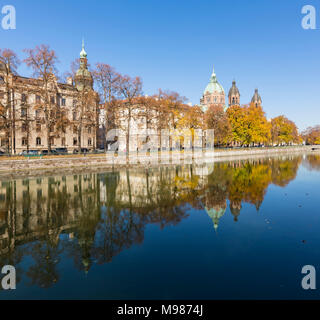 Germany, Bavaria, Munich, River Isar, St Luke's church in autumn Stock Photo