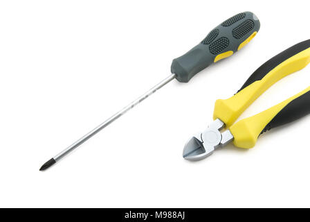 Screwdrivers and cutter isolated on white background Stock Photo