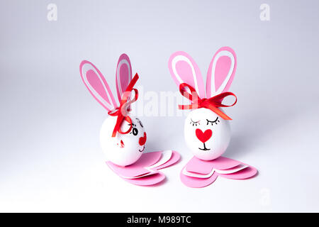 Funny easter eggs boy and girl Stock Photo