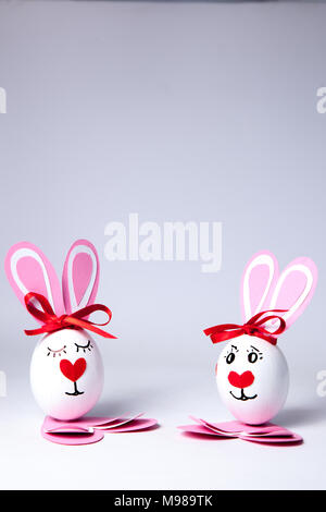 Funny easter eggs boy and girl Stock Photo