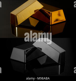 Gold bullion and silver bars on a black background Stock Photo