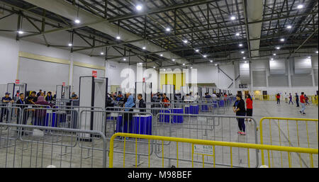 Singapore - Feb 11, 2018. People waiting at bus station to Changi Airbase in Singapore. Stock Photo