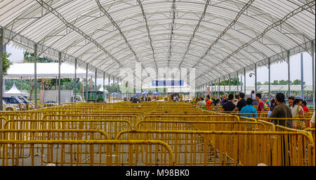 Singapore - Feb 11, 2018. People waiting at bus station to Changi Airbase in Singapore. Stock Photo