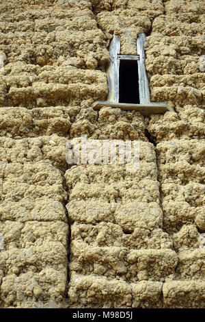 Wall mad of rammed earth of the watching tower of weiwu of Dafuzhen, a fortress-like enclosed farm house  in Fujian, China Stock Photo