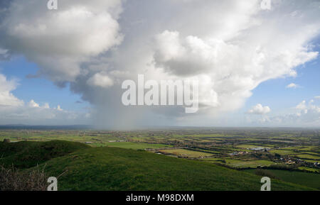 Storm Clouds with Heavy Rain over Somerset Levels Viewed from top of Brent Knoll Stock Photo